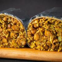 Punjabi by Nature Burrito · Saag paneer and tikka masala with rice, and sliced onions wrapped up in a tortilla with choi...