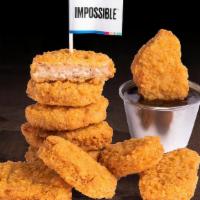 10 PIECE IMPOSSIBLE™ CHICKEN NUGGETS · 10 Crispy fried Impossible™ chicken nuggets; served with choice of dipping sauce
