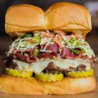 The Mensch · White American cheese, pickles, pastrami, Haus slaw, secret sauce.