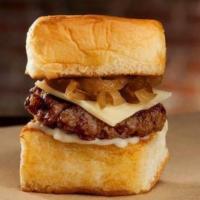Cheeseburger Slider · Angus Beef, mayo, white American cheese, caramelized onions, served on a king’s Hawaiian roll.