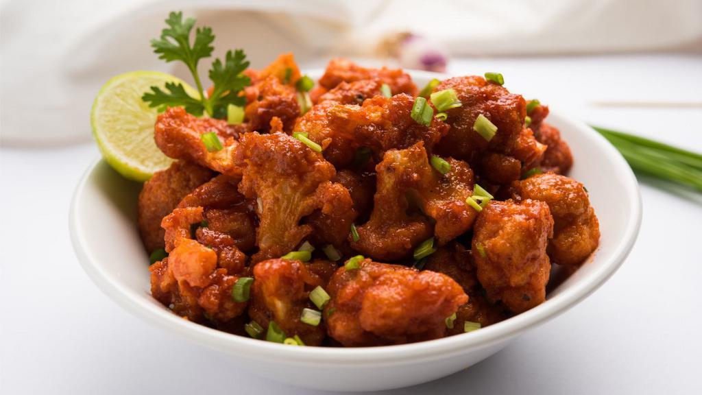 Gobi Manchurian · Vegetarian classic cauliflower, corn flour, soy sauce, chilli sauce, ginger & garlic deep-fried and cooked with indian spices.