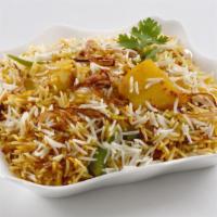 The Dum Aloo Biryani · Fresh baked potatoes, vegetables and basmati rice slowly cooked in clay pot for exotic dum-b...