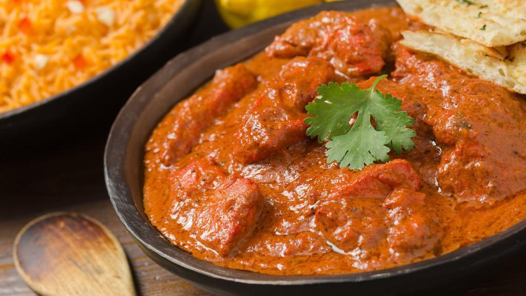 Classic Chicken Tikka Masala · Fresh boneless tender pieces of chicken cooked with tomatoes, bell peppers, onions and tomatoes, flavored with Indian herbs.