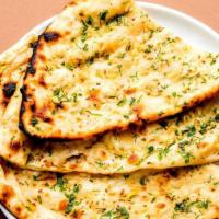 Garlic Naan · Classic garlic tandoor naan.