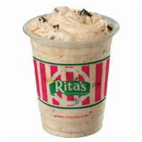 Cookies 'N' Cream with Reese's  PB Sauce · Vanilla soft serve blended with OREO pieces and PB Sauce