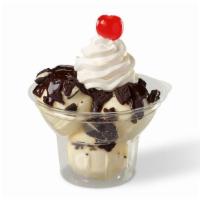 Hand-Scooped Custard Sundae · Two toppings, whipped cream, and cherry.