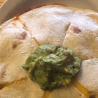 Cheese Quesadillas · Flour tortillas stuffed with melted cheese. Served with guacamole and lettuce.