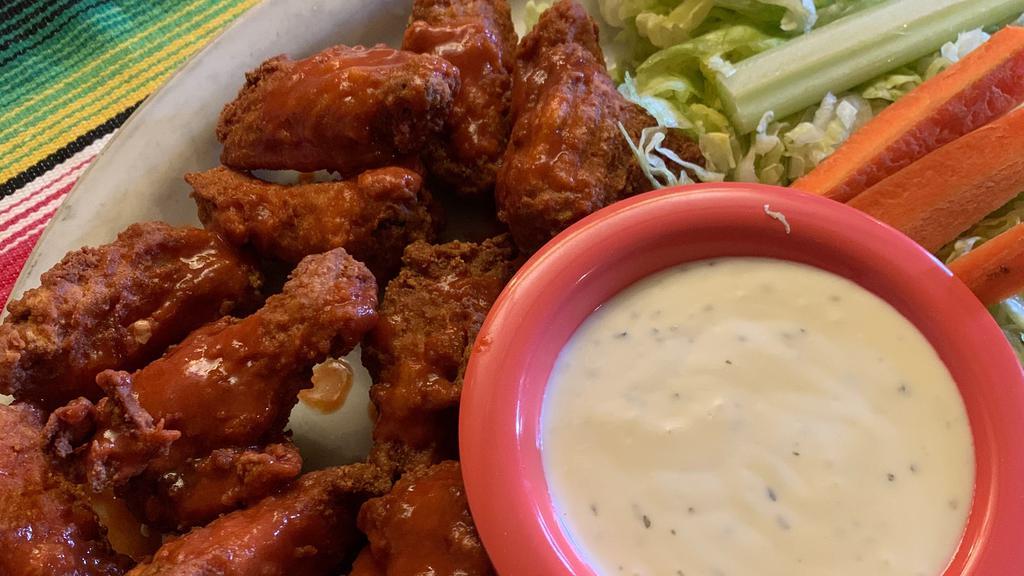 Celia’s Hot Wings · Chicken wings served with ranch dressing, carrot and celery sticks.
