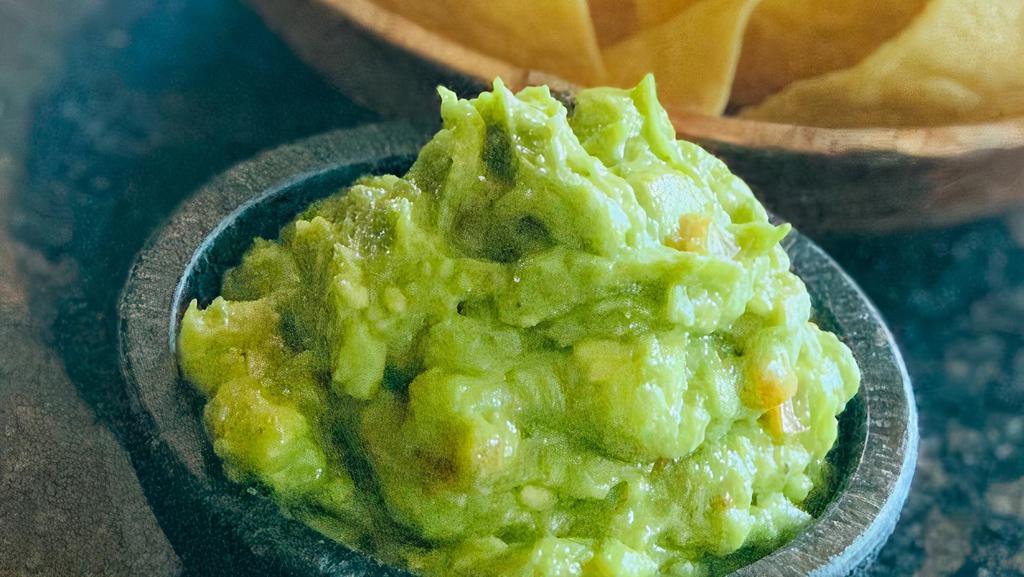 Guacamole · Avocado dip with chips and salsa. Contains onion, tomatoes, and cilantro. Unable to make modifications with this item.