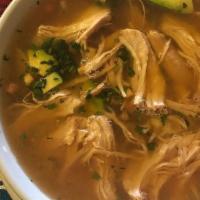 Tortilla Soup · Made with onions, avocado and cheese.