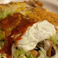 Two Flautas · With guacamole and sour cream.