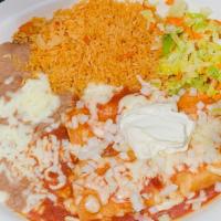 #15. (2) Crab Enchiladas · With sour cream and onions.