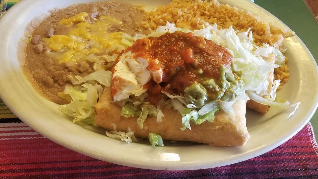 Chimichanga · With sour cream and guacamole. Served with rice, beans or rice and beans.