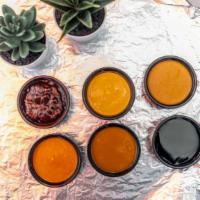 Extra Sauce · Need more sauce? We know!
Choose from our 6 amazing flavors so you can dip or pour the way y...