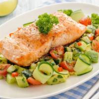 Salmon Cucumber Salad · Salmon on a bed of fresh and locally grown greens, tomatoes, cucumbers, green peppers, green...