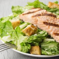 Salmon Caesar Salad · Salmon. crispy lettuce, cheese, and croutons served with a side of caesar dressing