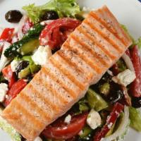 Salmon Greek Salad · Salmon, lettuce, tomatoes, cucumber, kalamata olives, and feta cheese served with balsamic d...
