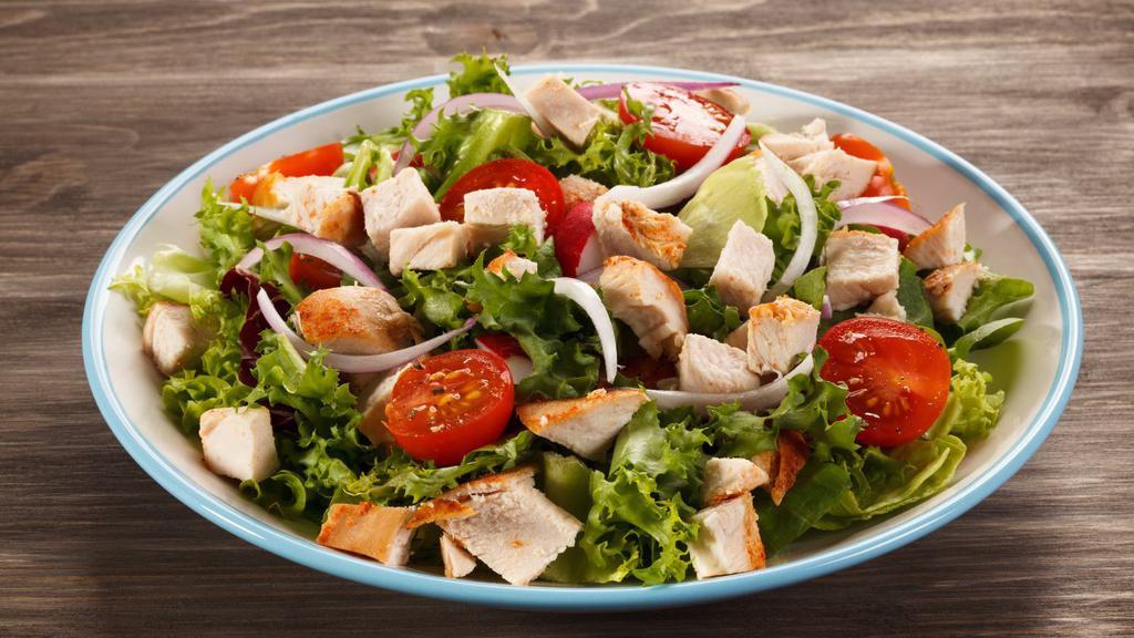 Chicken Parsley Salad · Hearty grilled chicken on a bed of chopped parsley, diced tomatoes, and green onions tossed with freshly squeezed lemon juice