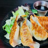 Gyoza (5 pieces) · Japanese style potstickers.