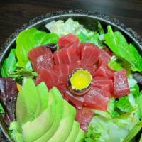 Volcano Salad · fresh tuna, avocado tossed in a special spicy sauce served with mixed green topped with quai...