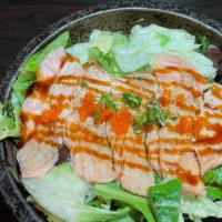Salmon Salad · seared salmon belly with mixed green, radish, with chef's dressing.