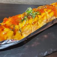 Lion King Roll · imitation crab, avocado topped with salmon & baked with tobiko.