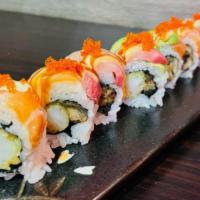Golden City Roll · shrimp tempura, unagi topped w/hamachi, salmon, avocado, and house sauce.