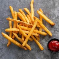 Golden Fries · Crispy golden fries served with a side of ketchup.