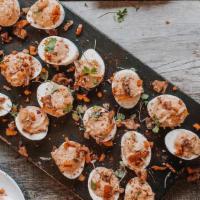Deviled Eggs Party Pack  · 2 dozen deviled eggs, candied bacon, beer crispies, smoked paprika, microgreens, pickled fre...
