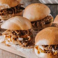 Pulled Pork Roadies Sliders Party Pack · Pack of 6, gold bbq sauce, pickles, chopped onion.