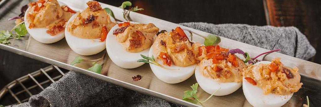 Deviled Eggs · Candied bacon, beer crispies, smoked paprika, pickled fresno.