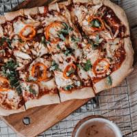 Bbq Chicken Flatbread · Beer-cooked chicken, bbq red sauce, shredded pepper jack, pickled fresnos, caramelized onion...