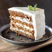 Carrot Cake · Made from scratch with our brewed on-site Kölsch beer, stacked four layers high + loaded wit...