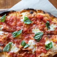 Pizza Margherita · Tomato, mozzarella & basil