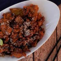 Famous Nanking Sesame Chicken · 30 year classic. Served with glazed sweet potato. Crispy marinated juicy dark meat chicken, ...
