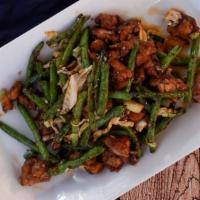 Chicken and Green Beans · Tender chicken sautéed in ginger soy black bean sauce.