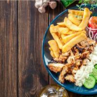 Halal Chicken Gyro Plate · Classic chicken gyro served with french fries, homemade hummus, and your choice of salad on ...
