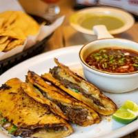 PLATO DE QUESABIRRIAS $16 · Three tacos that have been dipped in broth, thrown on a grill to crisp and stuffed with melt...