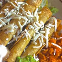 PLATO DE FLAUTAS $15.99 · crispy chicken flautas topped with cheese, sour cream, and a side of guac.