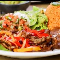 FAMOUS FAJITAS $18.99 · Grilled chicken, beef, or a mix of the two with grilled bell peppers and onions, and your ch...