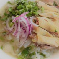 11.Chicken Noodle Soup招牌黄毛鸡汤粉 · Cage-free chicken with green onions, purple onions and cilantro, served with flat rice rice ...