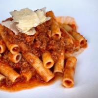 RIGATONI · Rustichella pasta, grana padano, beef-pork ragu