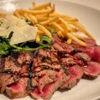 TAGLIATA · Sliced Certified Angus beef New York steak, french fries, wild arugula, shaved grana padano,...