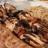 Kabab-E-Murgh · Tender cubes of chicken, marinated in herbs and fine spices, charbroiled on skewer and serve...