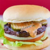The Classic Burger · Bib lettuce, tomato, vidalia onion, pickles, housemade P&B sauce, toasted brioche bun