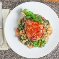 Pork Chop · 12oz bone-in, italian cannellini beans,slab bacon, organic green kale