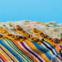 Carne Asada Quesadilla · Carne asada and shredded melted cheese in a crispy flour tortilla and served with a side of ...