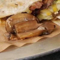 Mushroom Quesadilla · Roasted mushrooms and shredded melted cheese in a crispy flour tortilla and served with a si...