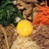2.  Hot Stone Bowl Bibimbab · Rice and assorted vegetables with the choice of beef, tofu, chicken, or pork, egg on hot sto...