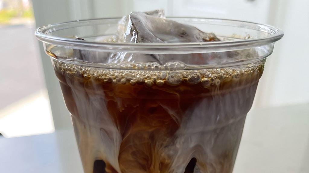 Iced Americano · Vegetarian. Our Americano is our double shot of espresso with water to recreate coffee! (The picture shows Americano with milk).